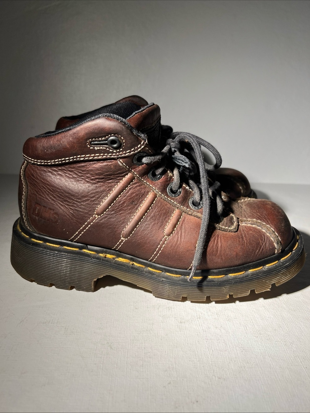 Dr. Martens Kids Brown Leather Lace-Up Boots with Yellow Stitching